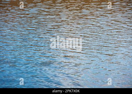 River water surface details, reflections and abstracts, ripples and patterns. Stock Photo