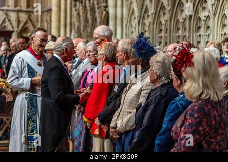 King Charles III distributes the Maundy Money during the Royal Maundy Service at York Minster. Picture date: Thursday April 6, 2023. Stock Photo