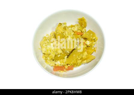 stir fried pumpkin with egg on plate in white background Stock Photo