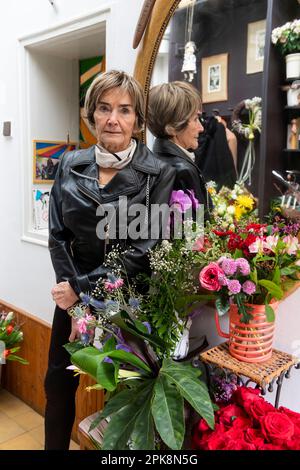 90 years old, well aged woman, former singer, with flowers after her ninetieth birthday celebrations Stock Photo
