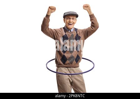 Happy elderly man spinning a hula hoop isolated on white background Stock Photo