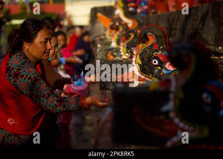 Kathmandu, Nepal. 6th Apr, 2023. People perform a ritual during the Baishak  Asnan festival in Kathmandu