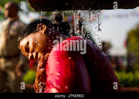 Kathmandu, Nepal. 6th Apr, 2023. A woman takes a holy bath during the Baishak Asnan festival in Kathmandu, Nepal, April 6, 2023. The locals believe that taking a holy bath on this day purifies one's spirit and makes one free from skin diseases. Credit: Sulav Shrestha/Xinhua/Alamy Live News Stock Photo