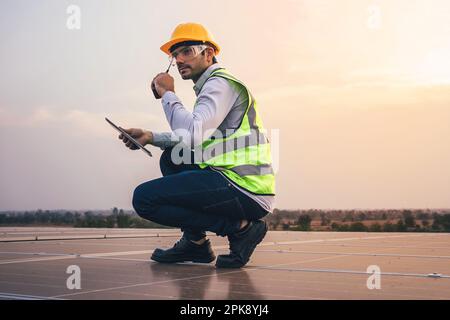 Engineer foreman in safety hard hat working at industrial plant Stock Photo