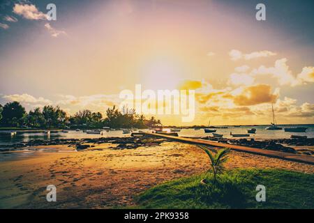 Cape Malheureux in the north of Mauritius, beautiful bay with beach and harbor, sandy beach in the evening for sunset Stock Photo