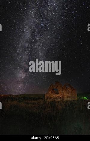 Milky Way over a church ruin. The Church of St.Mark on the island of Krk in Croatia Stock Photo