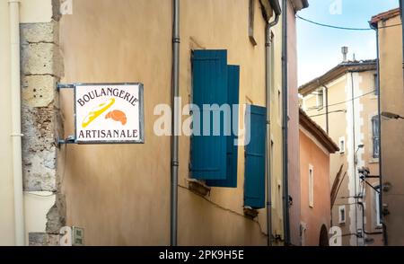 Advertising sign in Narbonne. Stock Photo