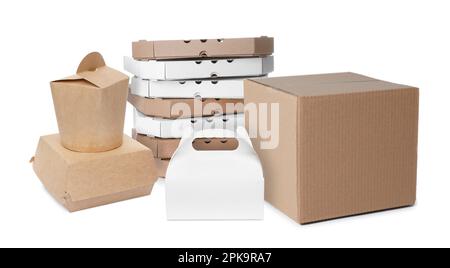 Set with different cardboard boxes on white background Stock Photo