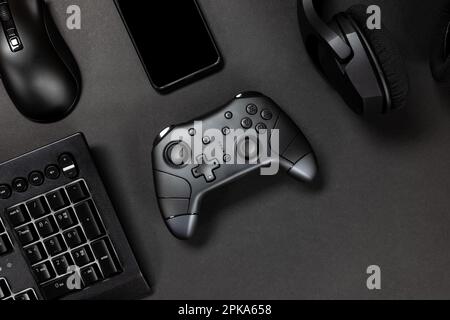 Modern gaming accessories on dark background Stock Photo by ©serezniy  329921194