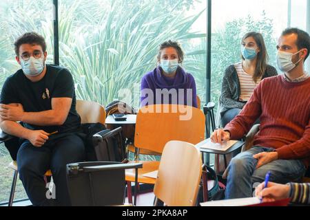 Emergency medicine students attends a circumstantial emergency simulation course led by two emergency physicians. Stock Photo