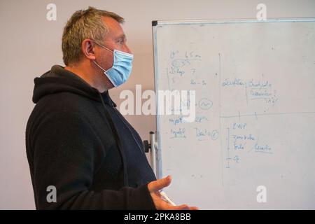 Emergency medicine students attends a circumstantial emergency simulation course led by two emergency physicians. Stock Photo