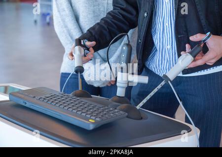 Internal students in digestive surgery train on a Lap Sim simulation device for surgical procedures. Stock Photo