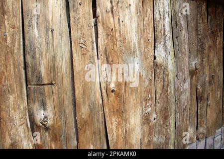 Old wooden economic fence made of boards Stock Photo