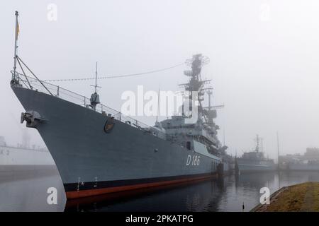 Foggy atmosphere, guided missile destroyer Mölders in the fog, German Naval Museum on South Beach, Wilhelmshaven, Lower Saxony, Germany Stock Photo