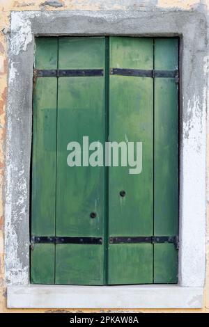 Burano shutters and windows. Colourful island near Venice in Italy. Stock Photo