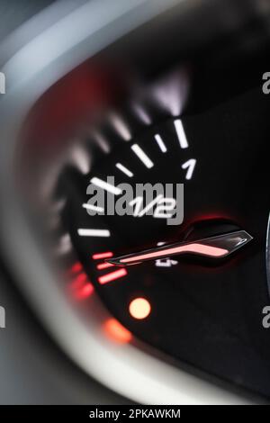Car fuel indicator with a low level fuel on dashboard of a car ...