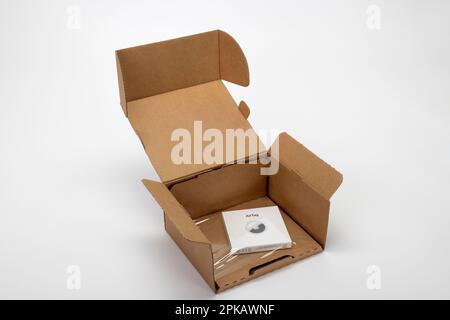 Apple AirTag, opened package, icon image, tracking tag, key finder ...