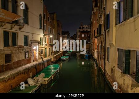 Midnight at a Canal in Cannaregio, nobody on the Street, Venice, Italy Stock Photo