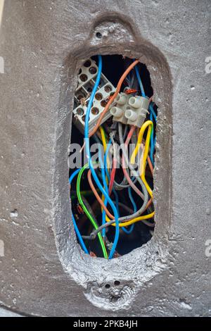 Light pole with open hole and electrical connection for a street lighting. Stock Photo