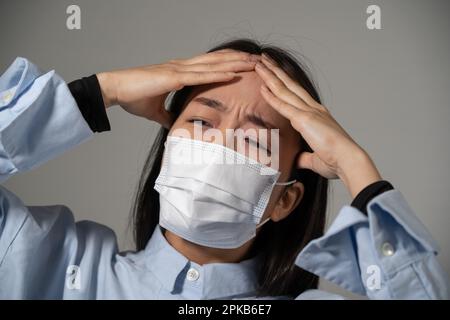 Young woman wearing protective mask. Stock Photo
