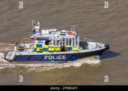 England, London, Metropolitan Police Boat on River Thames Stock Photo