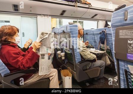 Japan, Honshu, Tokyo, Shinjuku Train Station, Train Passengers Stock Photo