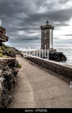 Lighthouse Phare De Kermorvan At Village Le Conquet At The Finistere Atlantic Coast In Brittany, France Stock Photo