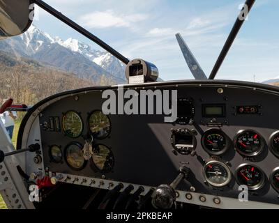 Light aircraft flight as seen from the cockpit, Aosta Valley, NW Italy Stock Photo