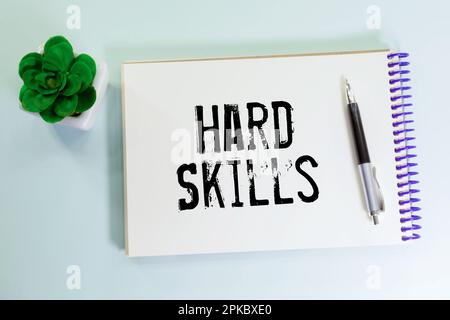 Business concept about Hard Skills beautiful working table plant in a pot. text on paper. Stock Photo