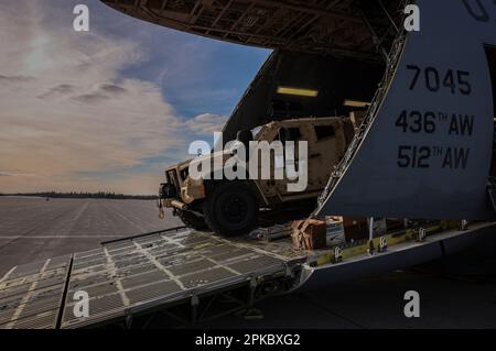 U.S. Marines with 1st Battalion, 10th Marine Regiment, 2d Marine Division disembark a joint light tactical vehicle during exercise Rolling Thunder on Fort Drum, New York, March 24, 2023. This exercise is a live-fire artillery event that tested the 10th Marine Regiment’s ability to operate in a simulated littoral environment against a peer threat in a dynamic and multi-domain scenario. (U.S. Marine Corps photo by Lance Cpl. Averi Rowton) Stock Photo