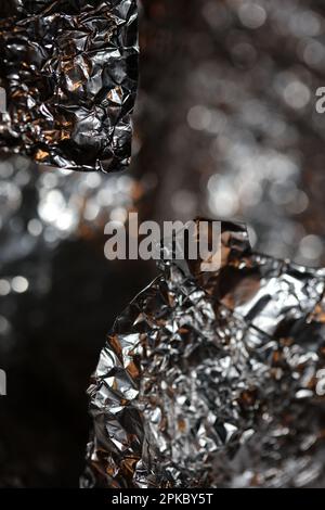 Aluminum foliage light effects design fire show party festive decorations abstract blurred background glowing texture shining pattern big size modern Stock Photo