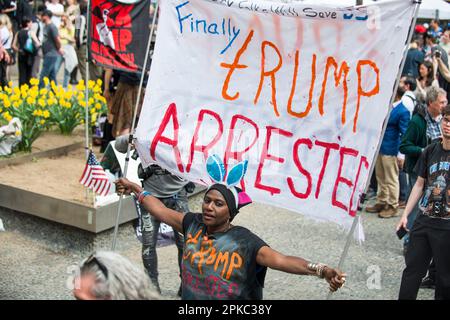 Anti-supporters of Donald J Trump rally outside Manhattan Criminal Court House, NYC, during Trump arraignment on 04 April 2023. Stock Photo