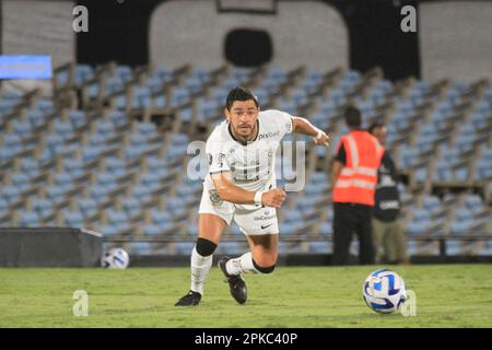 Montevideo, Uruguay, 06th Apr, 2023. Gaston Martirena of Liverpool battles  for possession with Yuri Alberto of Corinthians, during the match between  Liverpool and Corinthians for the 1st round of Group E of