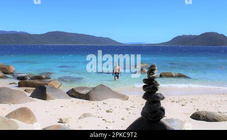 Nudey Beach, Fitzroy Island, rocks break through the crystal clear