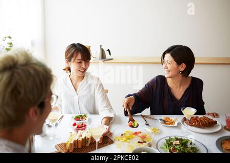 Groups of men and women who have home parties Stock Photo