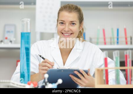 attractive young female lab technician Stock Photo