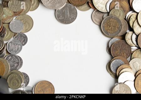 A collection of coins from around the world Stock Photo - Alamy