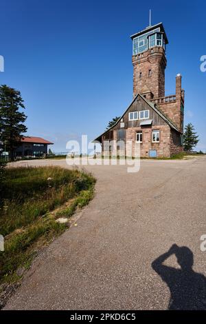 Hornisgrinde, Germany - August 11, 2021: Tower (Hornisgrindeturm) on the highest mountain in the northern black forest. Hiking trails lead through the Stock Photo