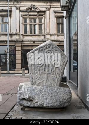 Belgrade, Serbia – February 2023: Medieval Stecak tombstone in front of the Ethnographic Museum Stock Photo