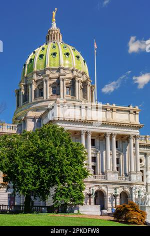 Pennsylvania State Capital Complex building with its green dome and gold statue atop, in autumn, Harrisburg, PA. Stock Photo