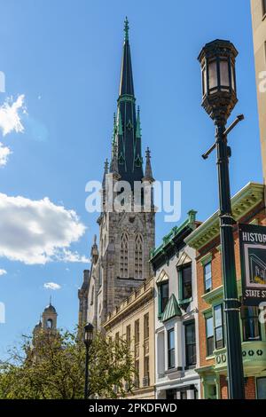 View of buildings and street lamps along historic State Street in Harrisburg, the capital city of the Commonwealth of Pennsylvania. Stock Photo
