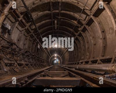 General view inside a tunnel of Mail Rail, the former  Post Office Railway system under the streets of central London, England. Stock Photo