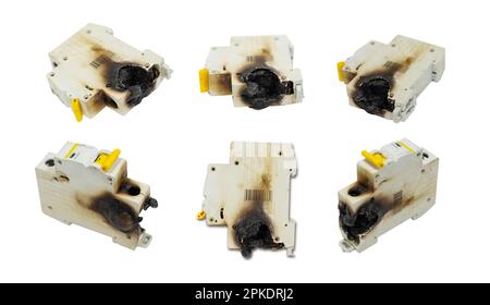 Several burned fuse boxes on a white background. Stock Photo