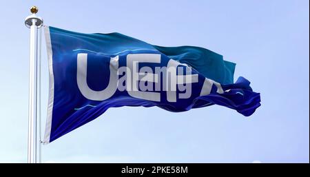 Nyon, CH, April 2023: flag with the UEFA logo waving in the wind. UEFA is the association that manages professional football in Europe. Illustrative e Stock Photo