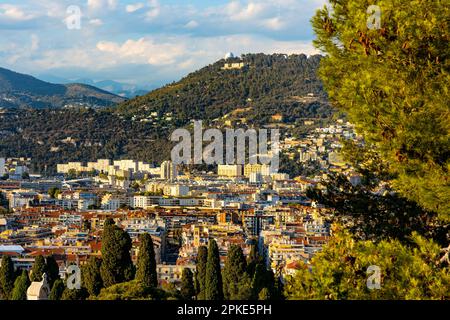 Nice, France - July 30, 2022: Nice sunset panorama with Riquier, Cimiez and Saint Roch historic old town with Alpes mountains at French Riviera Stock Photo