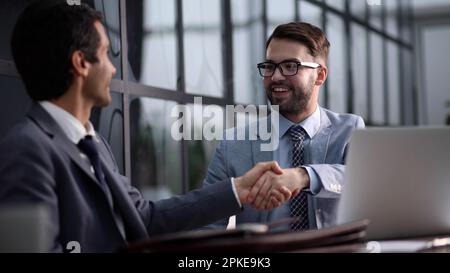 mature man using laptop for calculating reports and summarizing accounts, businessman at work Stock Photo