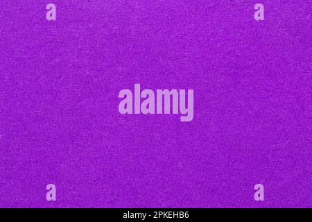 Purple fabric cloth texture background, seamless pattern of natural textile. Stock Photo