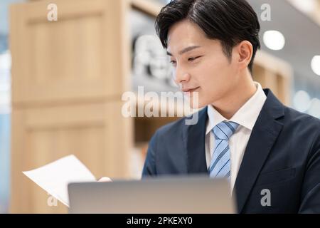 Businessman checking documents Stock Photo