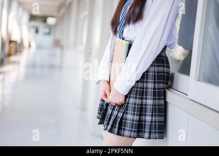Junior High School Girls Standing in the Hallway Stock Photo