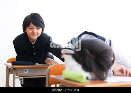 Dozing Activity Junior high school students dozing off Stock Photo - Alamy